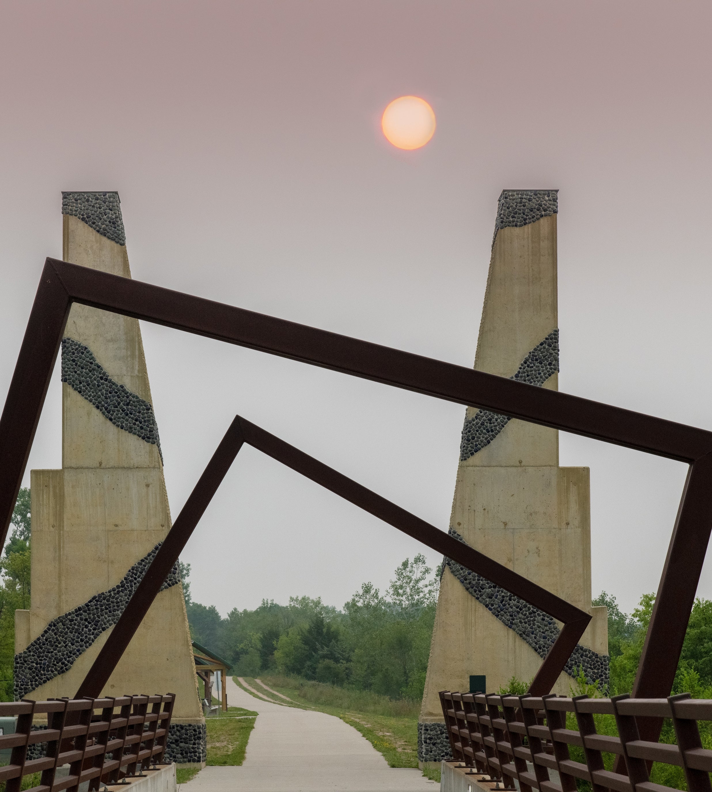 Hazy monoliths and sun